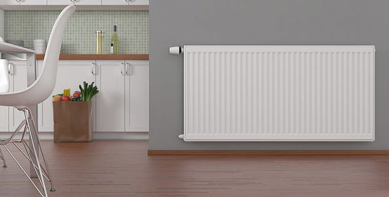 A wall mounted hydronic heating system.